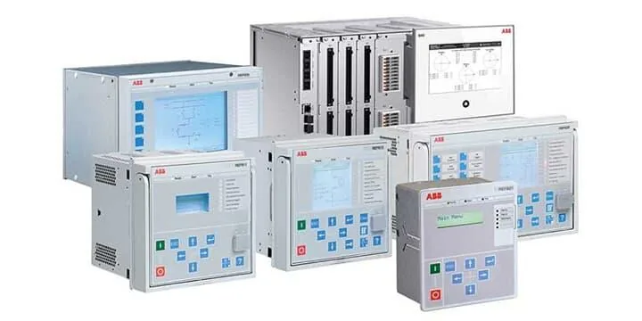 A group of ABB protection relays with front-panel displays and keypads